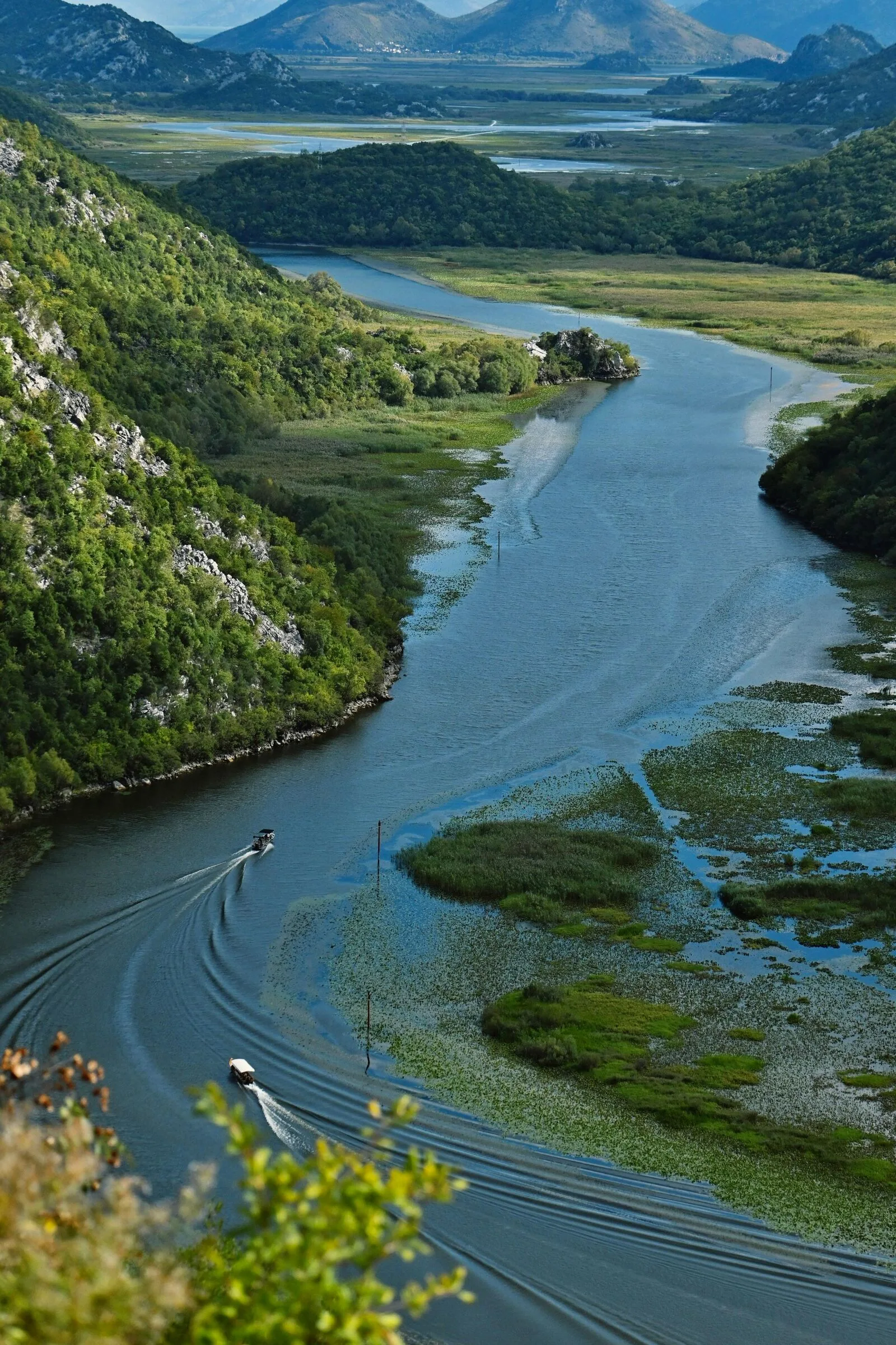 Boats on Skadar Lake river