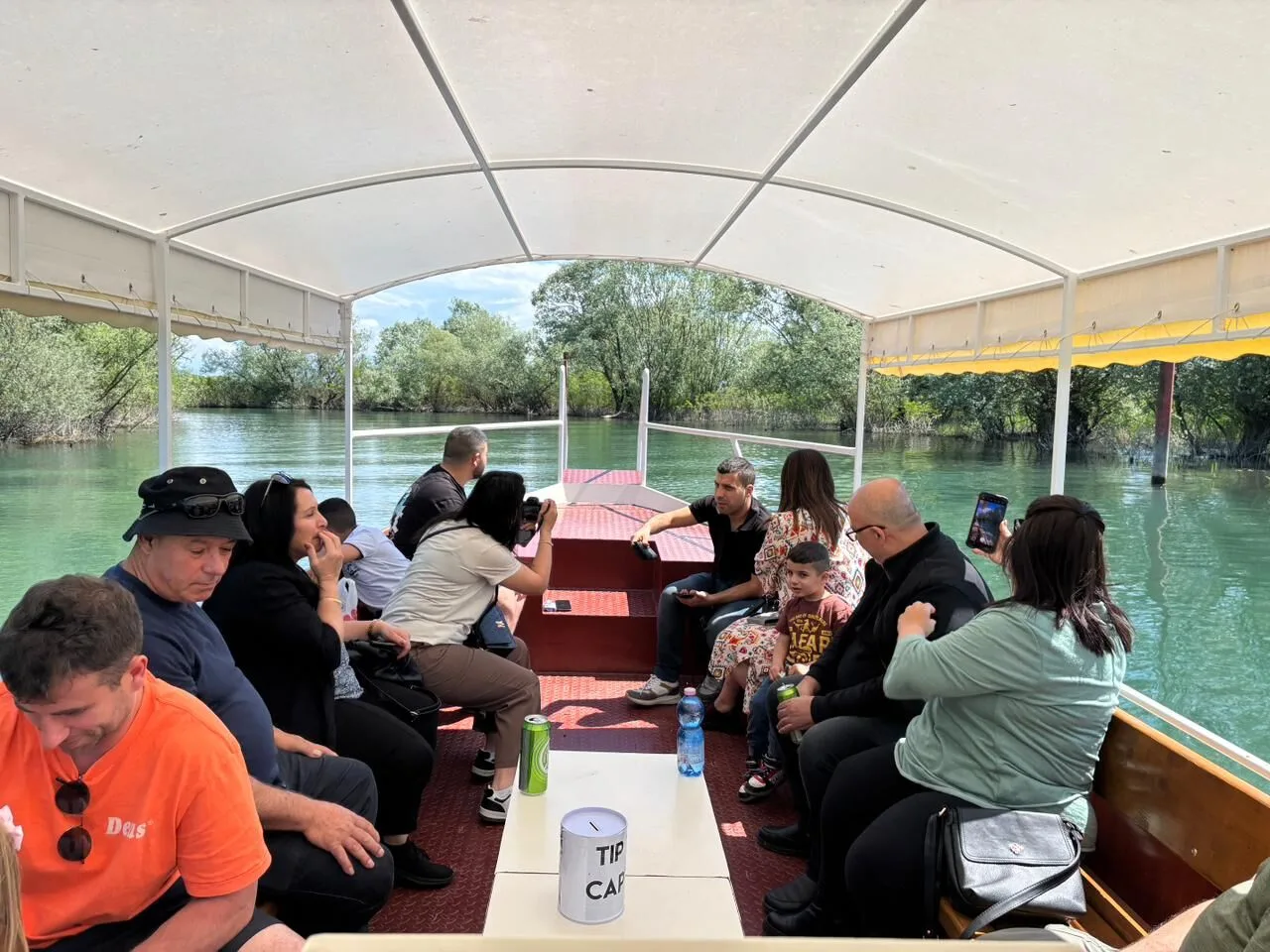 Tourists enjoying boat tour on canals